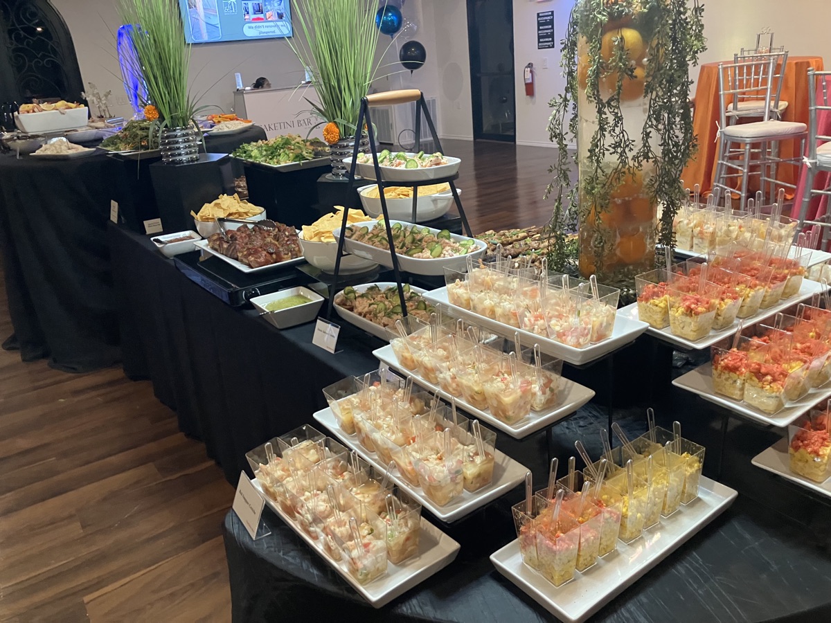 Appetizer cups in colorful rows
