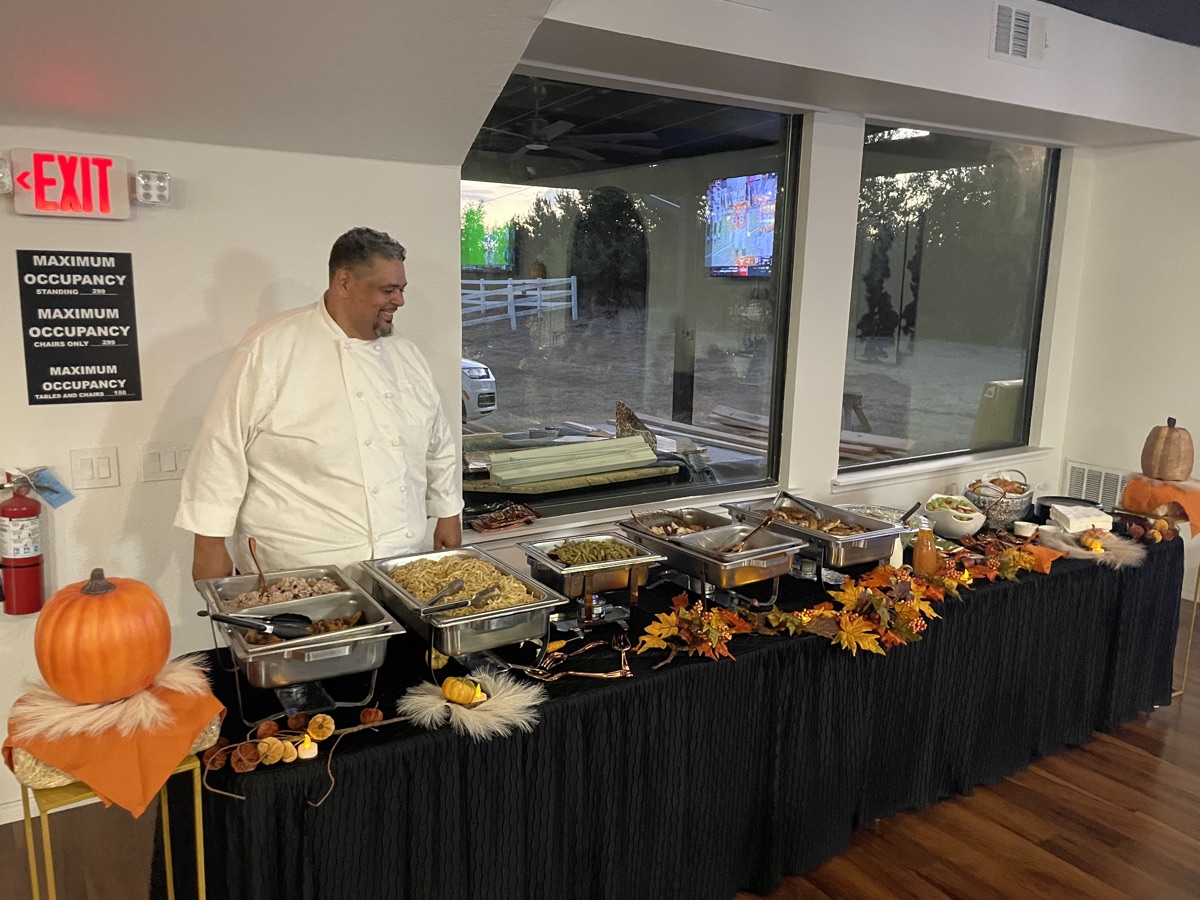 Chef and Thanksgiving buffet, alt angle