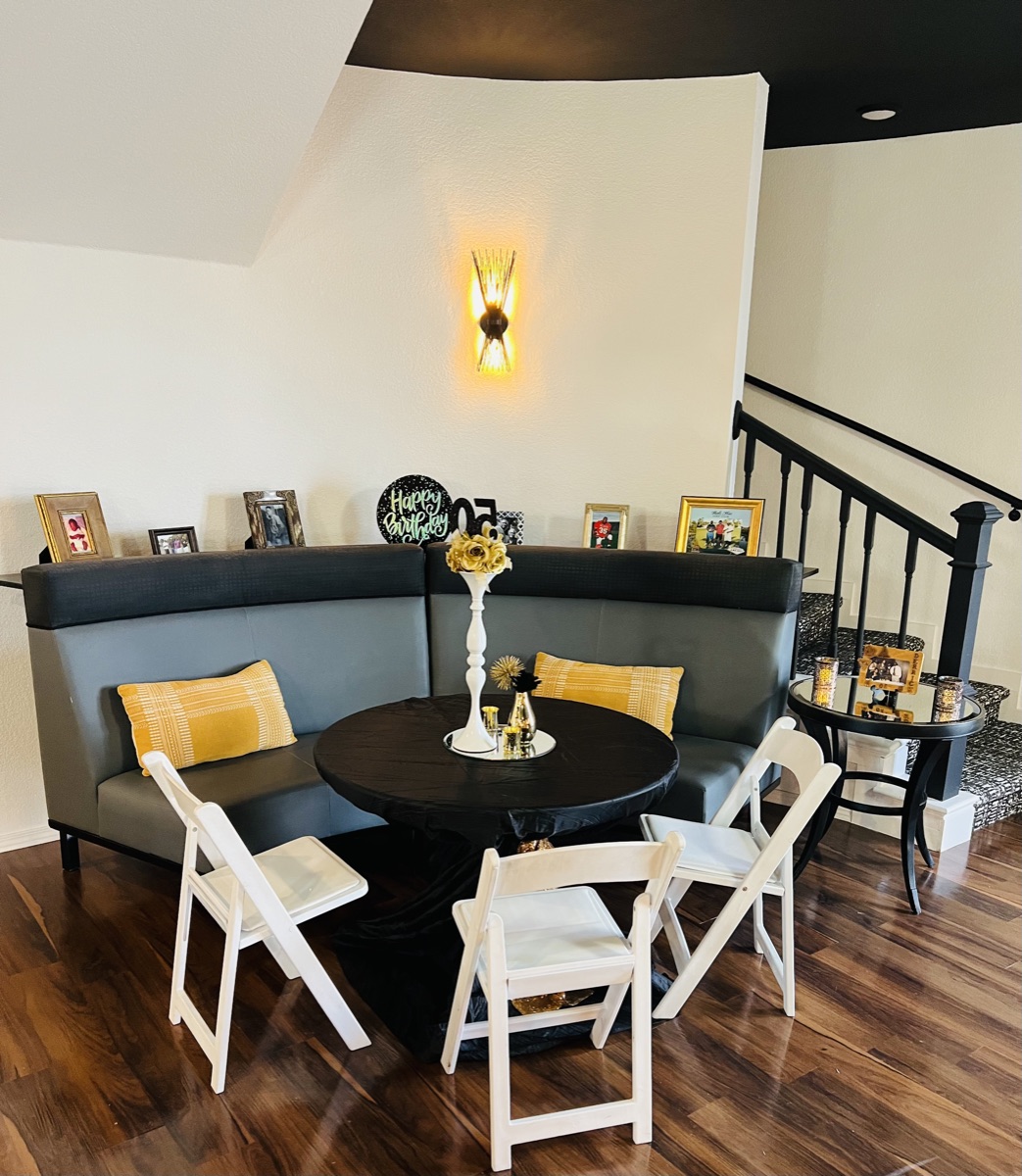 Banquette seating with yellow accents