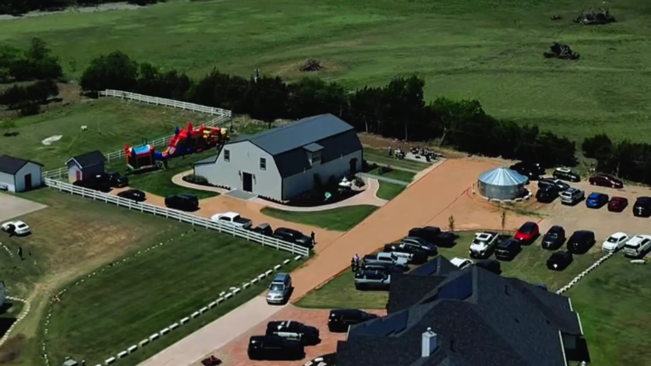 Wide aerial of the venue and property