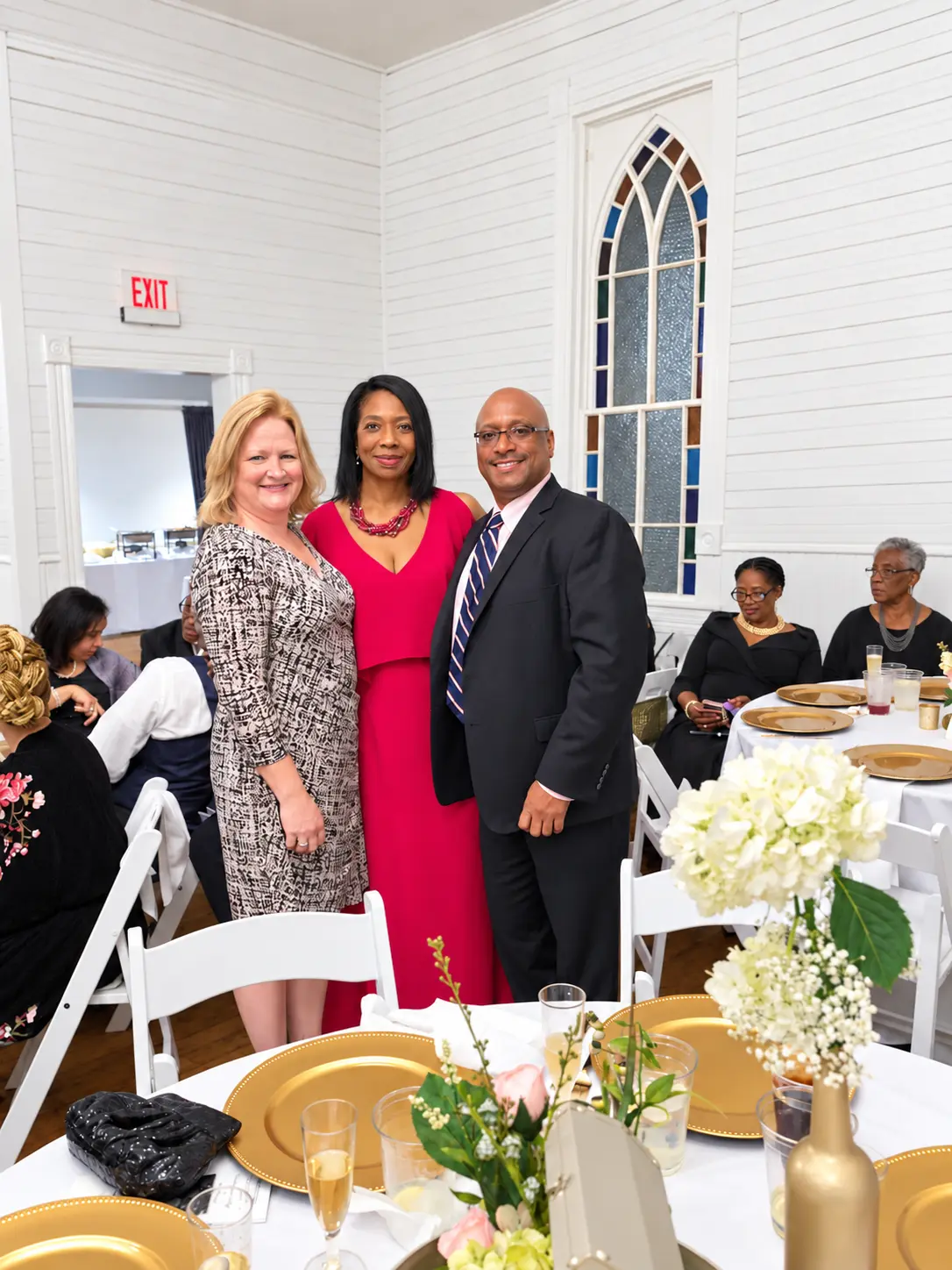 MacKenzie and Jesse with guests at their reception