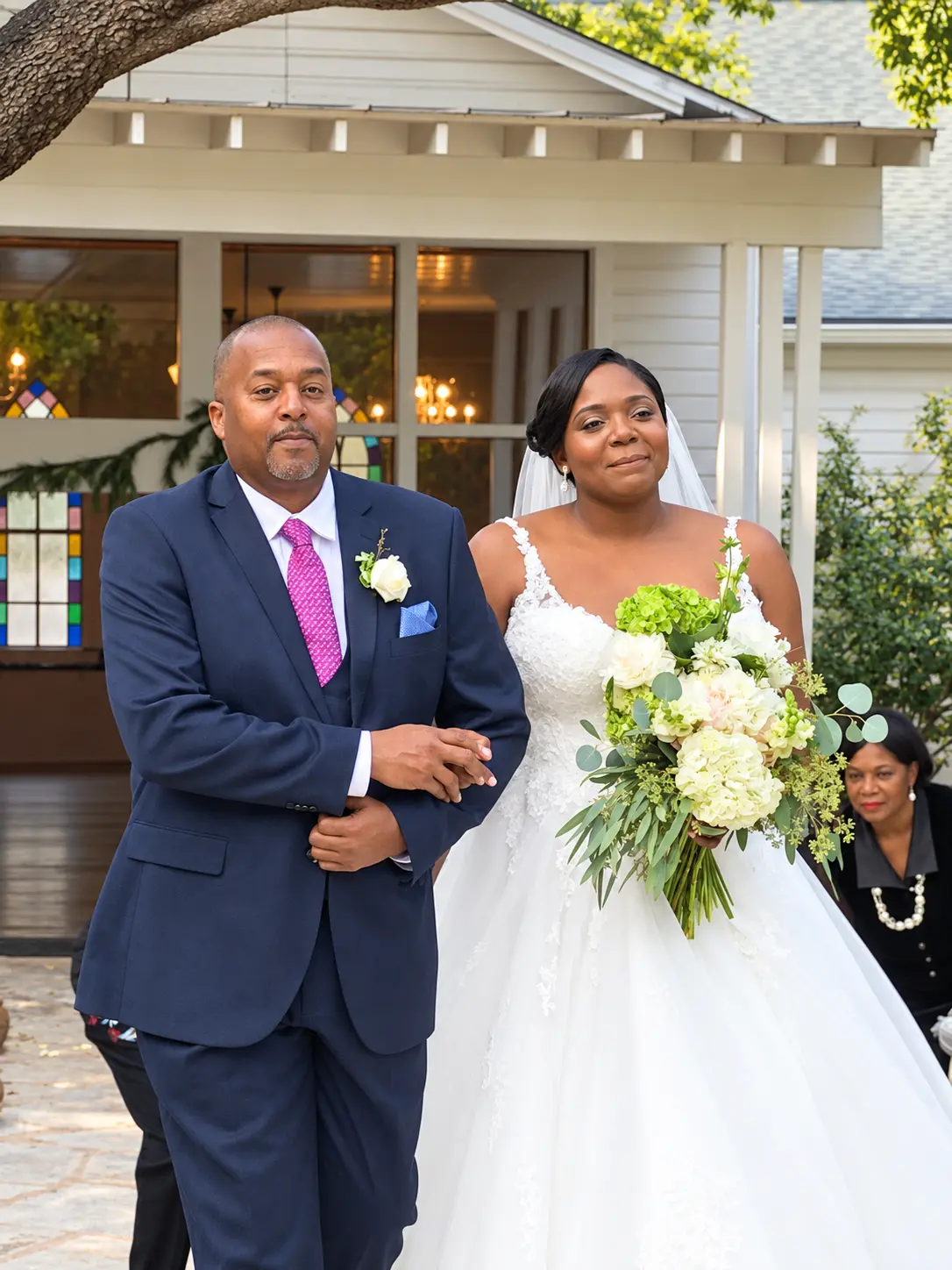 Bride beginning her wedding ceremony with a loved one