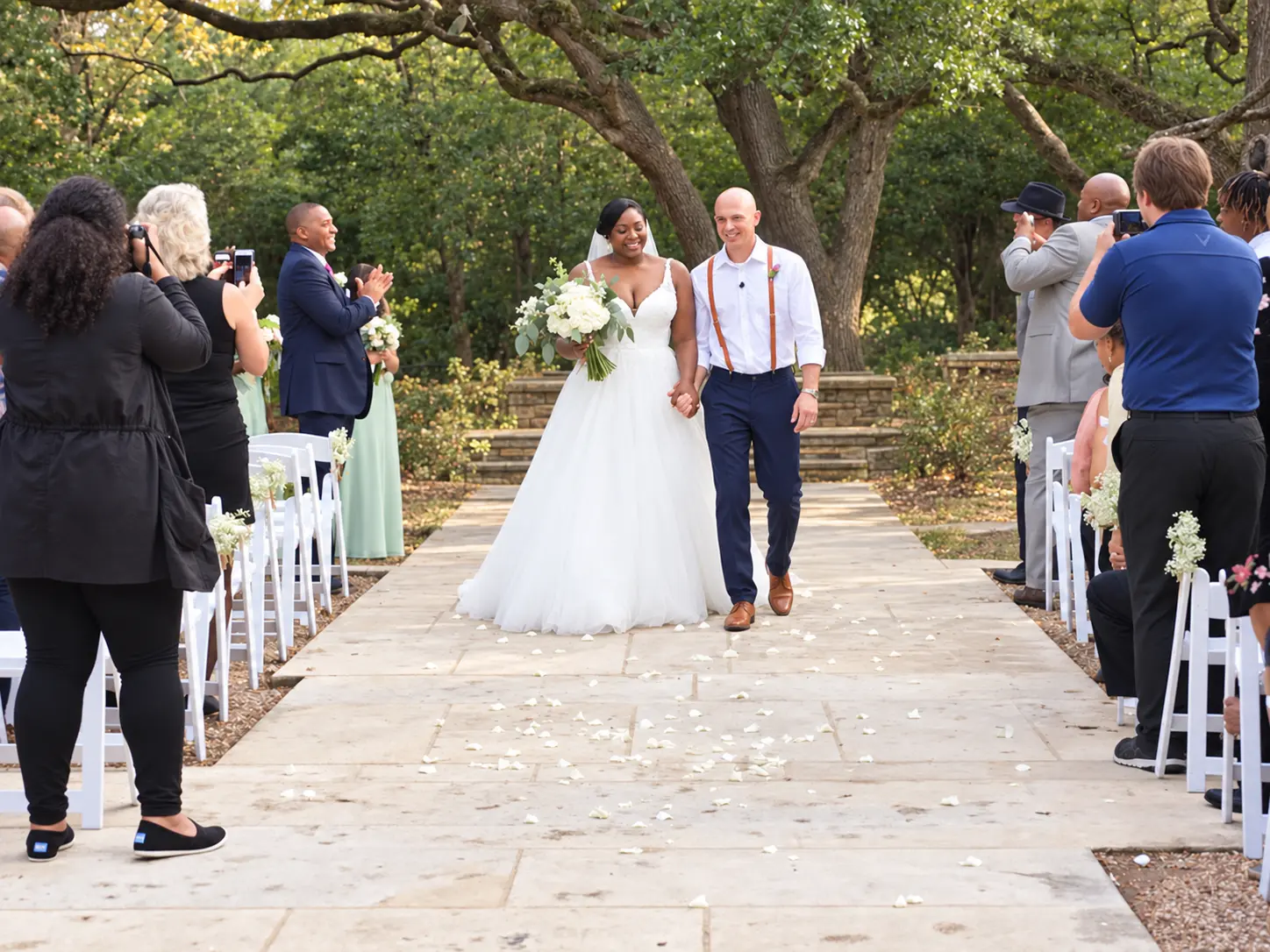 MacKenzie and Jesse walking together after their ceremony